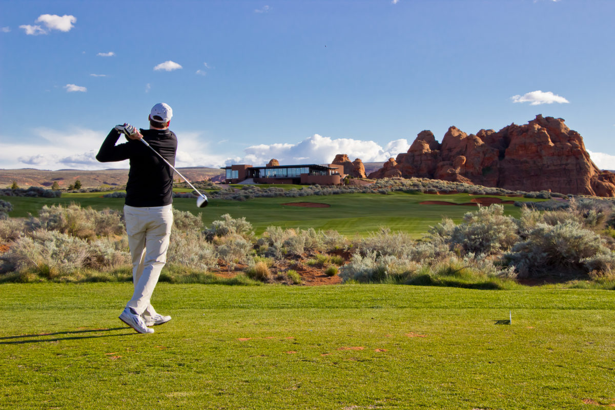Man in Backswing near Sand Hollow Clubhouse