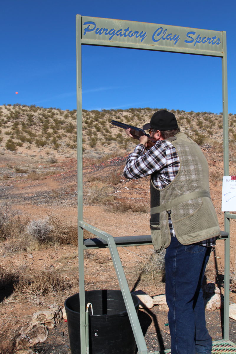 Man Aiming Shotgun at Purgatory Clay Sports