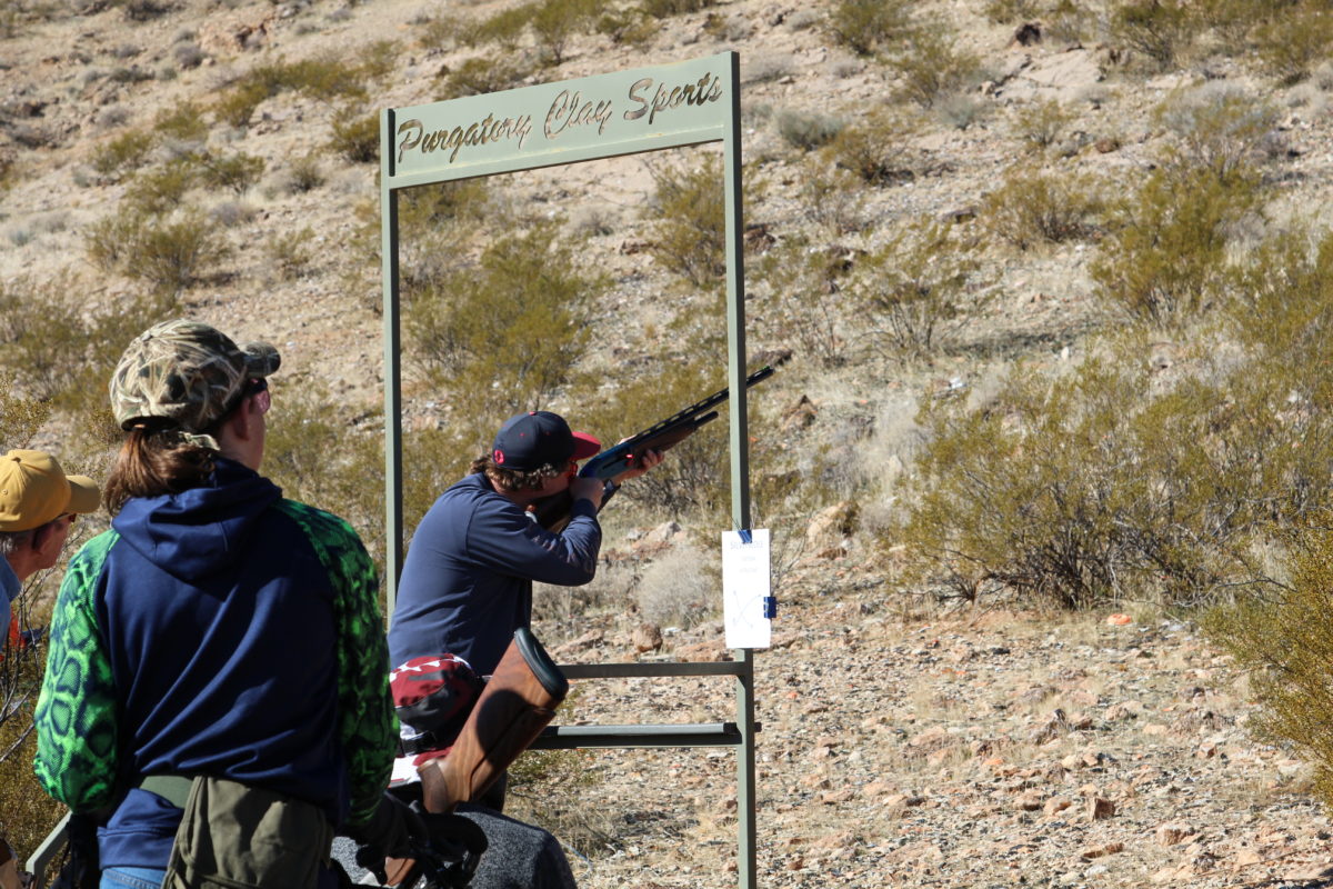 Spectators Behind Shotgun Shooter