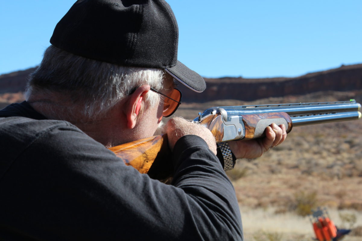 Closeup of Man Holding Shotgun